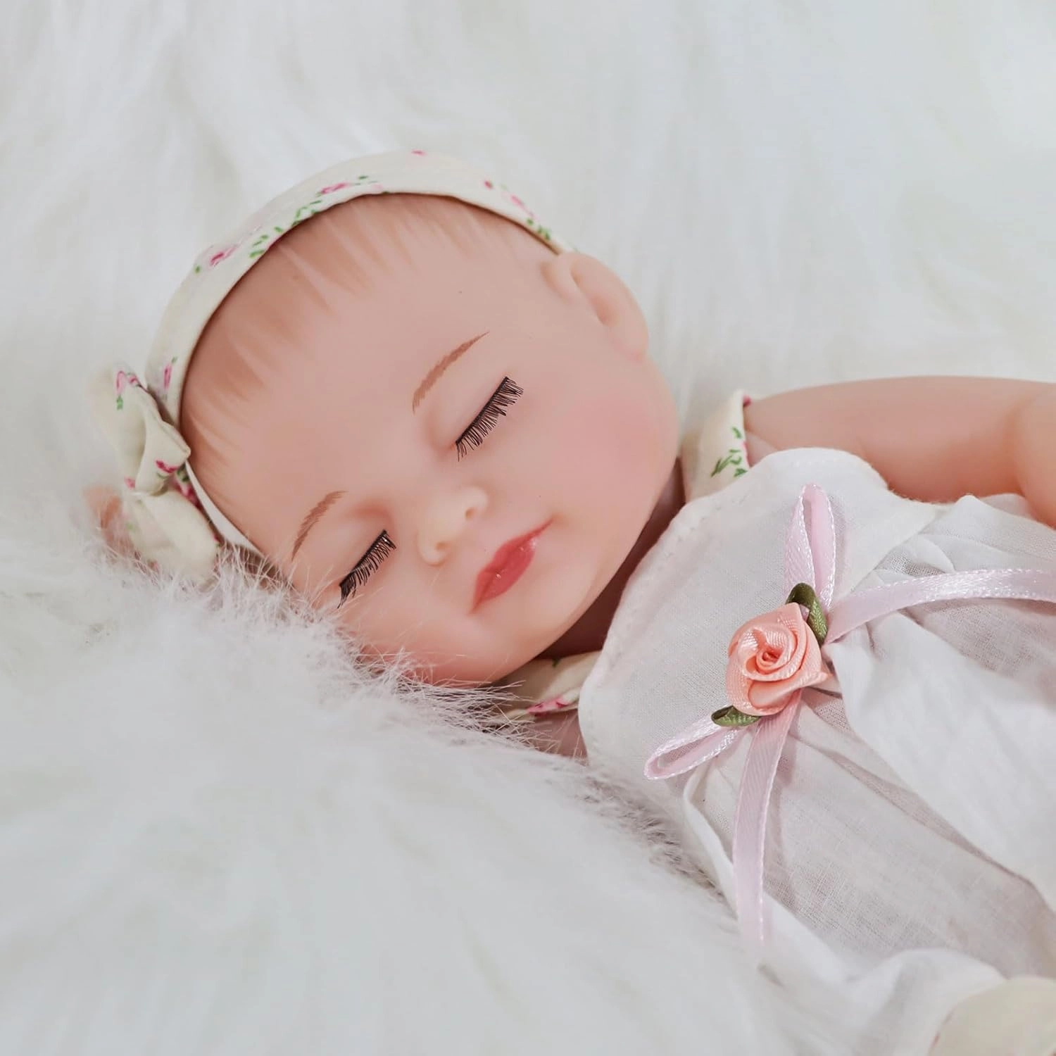 Reborn Baby Girl Doll, 10 Inches Realistic Newborn Soft Vinyl Baby Dolls Toy with Flower Dress, Birthday Baby Doll Gift for Kids Age 3  …
